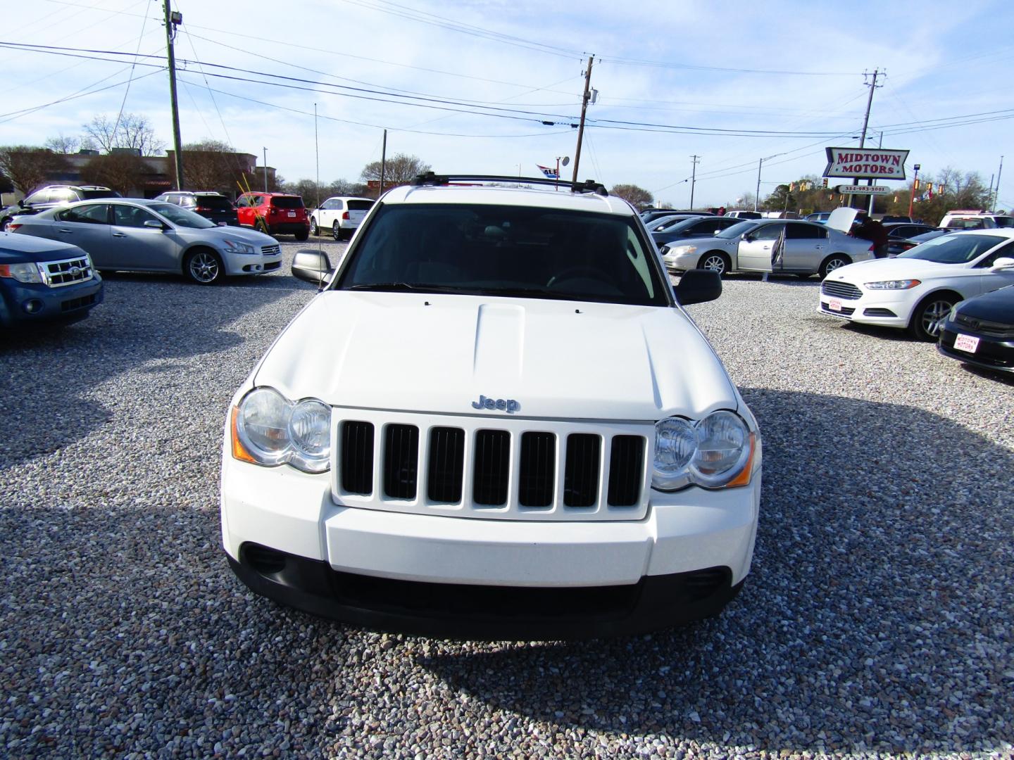 2009 WHITE Jeep Grand Cherokee (1J8GS48KX9C) , Automatic transmission, located at 15016 S Hwy 231, Midland City, AL, 36350, (334) 983-3001, 31.306210, -85.495277 - Photo#1